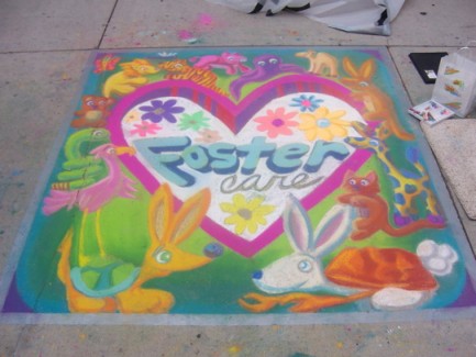 Animals surrounding a large heart painted with chalk