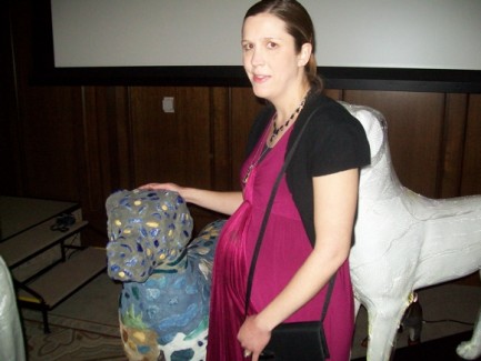 Marilee (my wife) stands with the dog at the charity auction