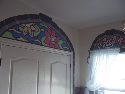 The word "Swan" is spelled out, with the letters creating a picture of a swan.