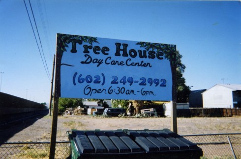 Painted sign for the Tree House Day Care Center
