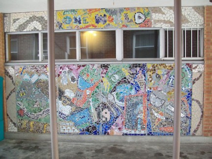 Mosaic mural on the side of a restaurant